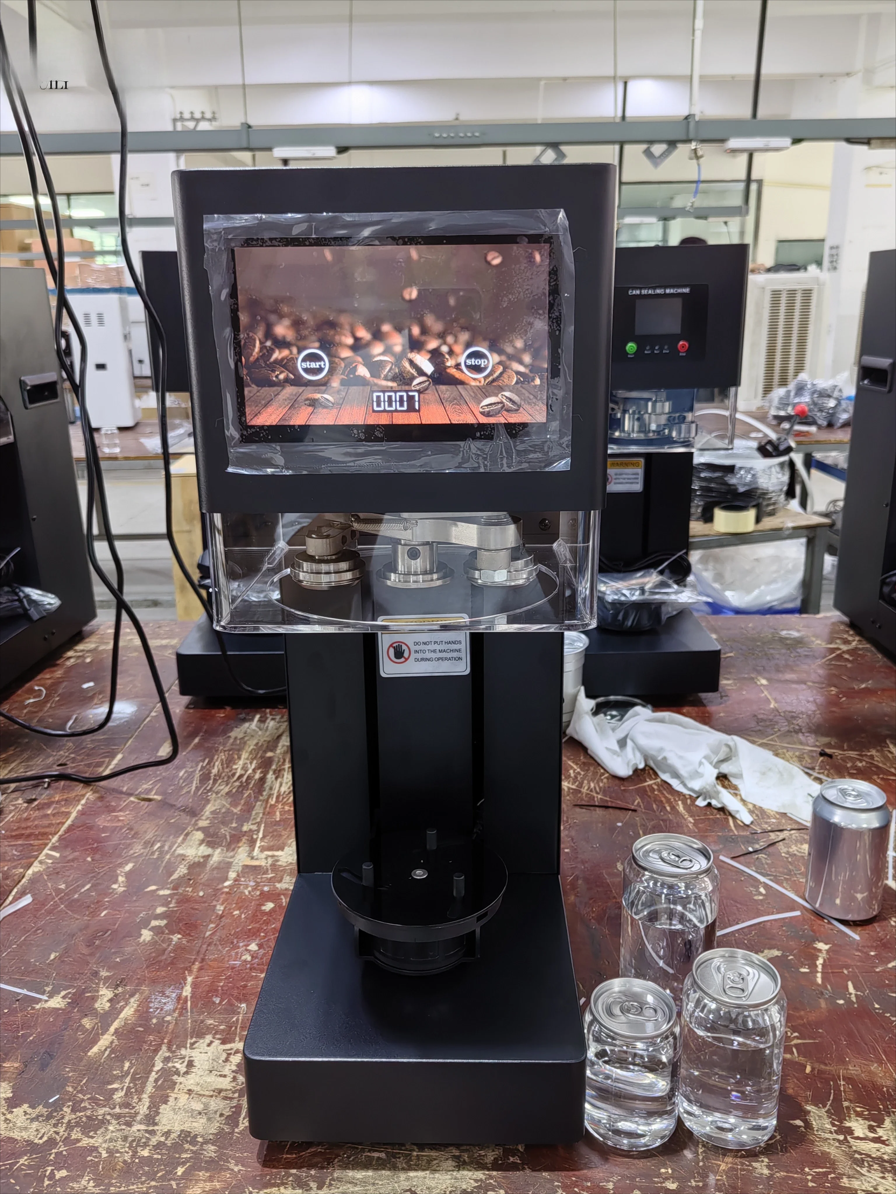 Seamer PET Can Sealing Machine - مراجعة Juice Tea Coffee وسعره